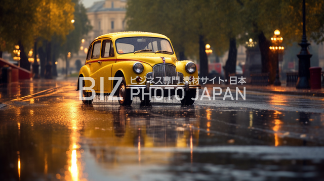 雨の中を走るタクシー